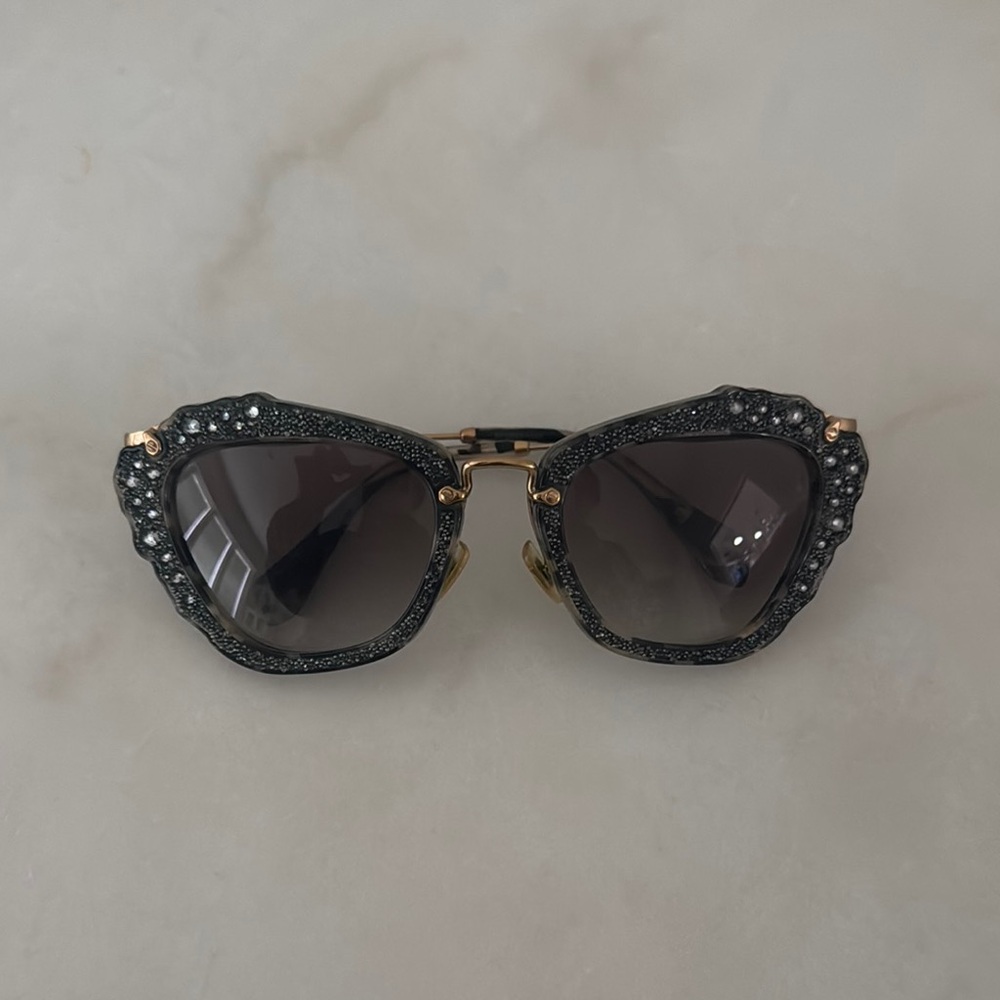 Miu Miu Elegant Black and Gold Sunglasses